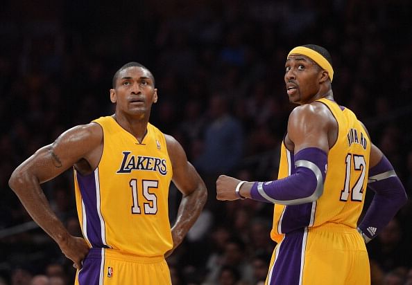 Dwight Howard #12 and Metta World Peace #15 of the Los Angeles Lakers 