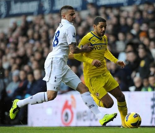 Tottenham Hotspur's Kyle Walker (L) vies with Reading's Jobi McAnuff (R) at White Hart Lane in London on January 1, 2013 Tottenham Hotspur's Kyle Walker (L) vies with Reading's Jobi McAnuff (R) at White Hart Lane in London on January 1, 2013