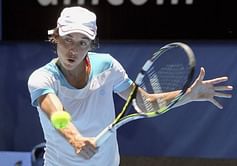 Schiavone fights back to lift Italy