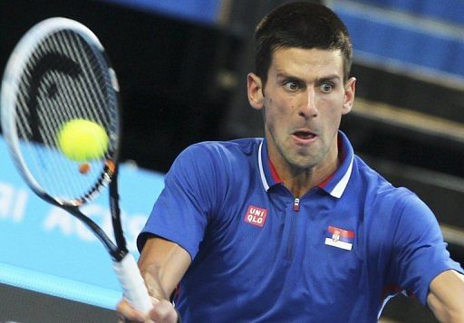 Novak Djokovic sufferes a shock defeat to Bernard Tomic in the Hopman Cup tennis tournament in Perth, January 2, 2013
