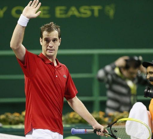 Richard Gasquet waves after beating Grega Zemlja in the 2013 ATP Qatar Open in Doha on January 2, 2013