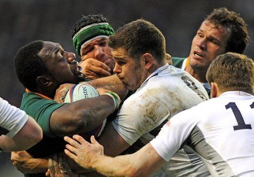 South African Tendai Mtawarira (left) and England&#039;s Hendre Fourie (2nd Left) at Twickenham, London, November 27, 2010.