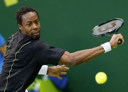 France's Gael Monfils hits a return to Germany's Daniel Brands on January 3, 2013 in Doha