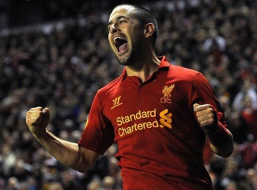 Joe Cole celebrates scoring for Liverpool in the Europa League match against Young Boys at Anfield on November 22, 2012