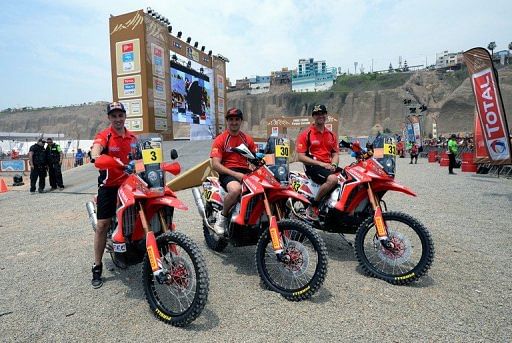 Honda&#039;s bikers pose for a photo in Lima, ahead of the 2013 Dakar Rally, on January 3, 2013