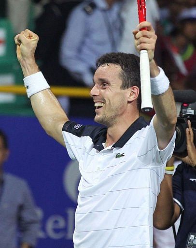 Roberto Bautista Agut of Spain celebrates his victory in Chennai on January 5, 2012