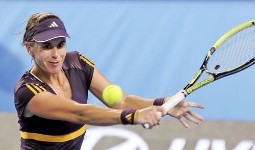 Anabel Medina Garrigues of Spain hits a return in Perth on January 5, 2013