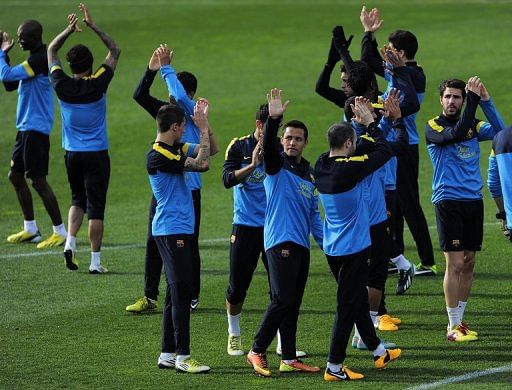 Barcelona&#039;s players, pictured during an open training session at the Mini Stadium in Barcelona, on January 4, 2013