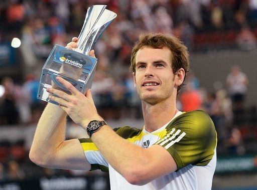 Andy Murray holds the trophy after winning the final of the Brisbane International tournament, on January 6, 2013