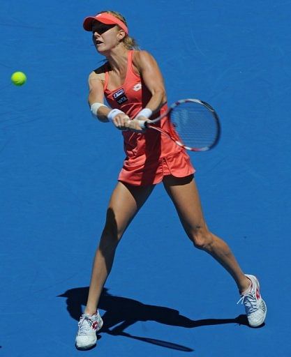 Urszula Radwanska of Poland plays a backhand return against Caroline Wozniacki on January 6, 2013