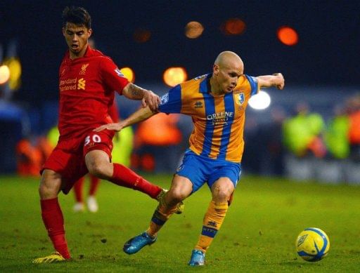Suarez in dock as Liverpool avoid FA Cup upset