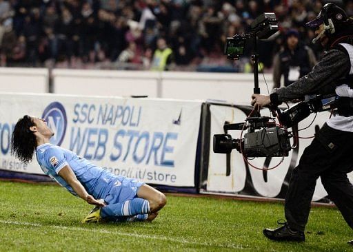 SSC Napoli&#039;s Edinson Cavani celebrates after scoring in Naples on January 6, 2013