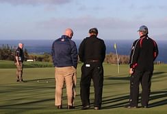 Play underway at wind-whipped Kapalua