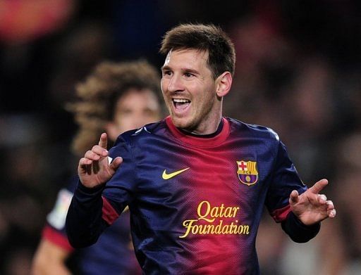 Barcelona forward Lionel Messi celebrates after scoring during a La Liga match against Espanyol on January 6, 2013