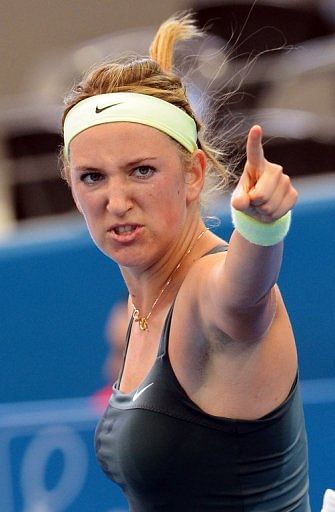 Victoria Azarenka celebrates victory over Ksenia Pervak at the Brisbane tournament on January 3, 2013.