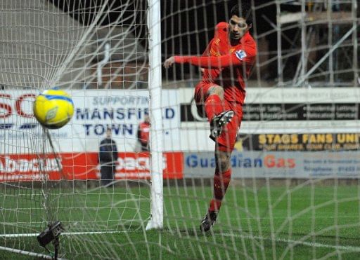 Commentator rapped over Suarez 'cheat' claim