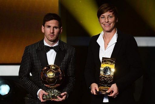 Ballon d&#039;Or winner Lionel Messi (L) and best woman player Abby Wambach at the FIFA awards ceremony on January 7, 2013