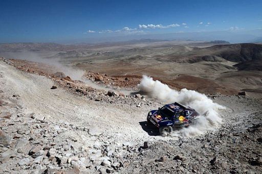 Qatar&#039;s Nasser Al-Attiyah competes during Stage 4 between Nazca and Arequipa, Peru, on January 8, 2013