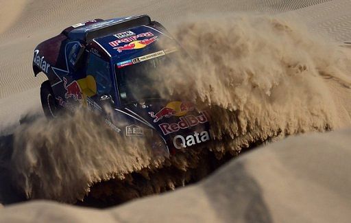 Qatar&#039;s Nasser Al-Attiyah competes during Stage 4 of the Dakar 2013 between Nazca and Arequipa, Peru