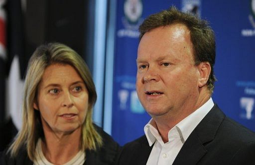 Bill Pulver, accompanied by his wife Belinda, at a press conference in Sydney on August 16, 2011