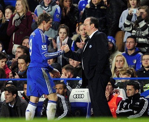 Chelsea&#039;s Fernando Torres (L) shakes hands with interim manager Rafael Benitez at Stamford Bridge on January 9, 2013