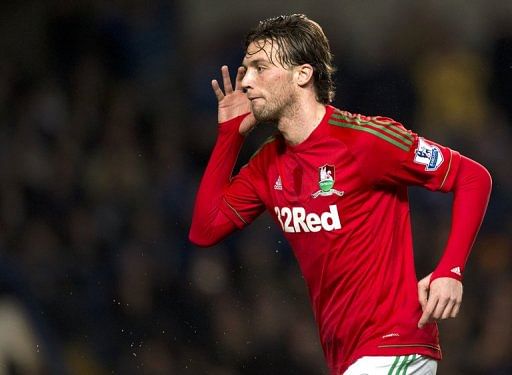 Michu scores the opening goal against Chelsea in their League Cup semi-final first leg on January 9, 2013