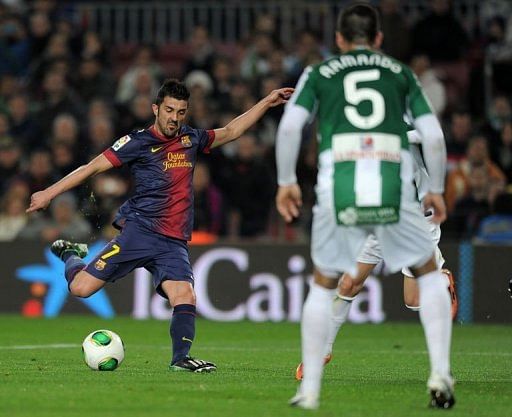 Barcelona forward David Villa scores during the Spanish Copa del Rey clash with Cordoba on January 10, 2013