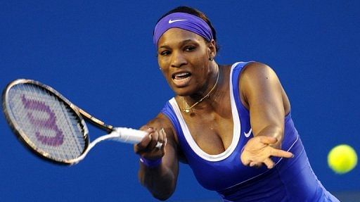Serena Williams of the US hits a shot against Greta Arn of Hungary at the Australian Open on January 21, 2012