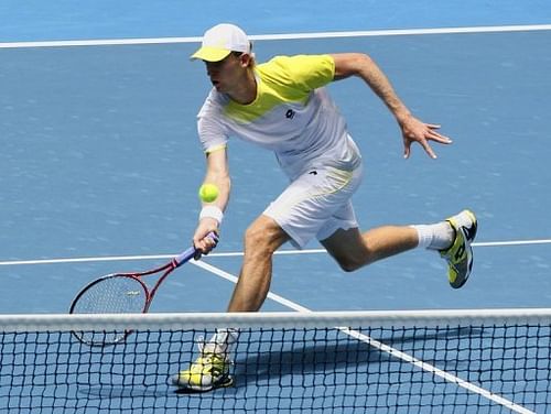 Kevin Anderson hits a volley against Fernando Verdasco of Spain at the Hopman Cup on December 29, 2012