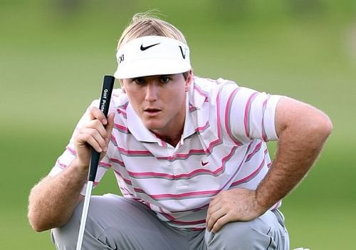 Russell Henley lines up a putt on the 13th hole during the second round of the Sony Open in Hawaii January 11, 2013