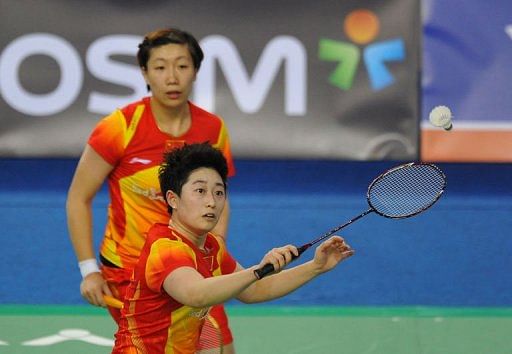 Yu Yang (right) and Wang Xiaoli play against South Korea at the Korean Open on January 12, 2013