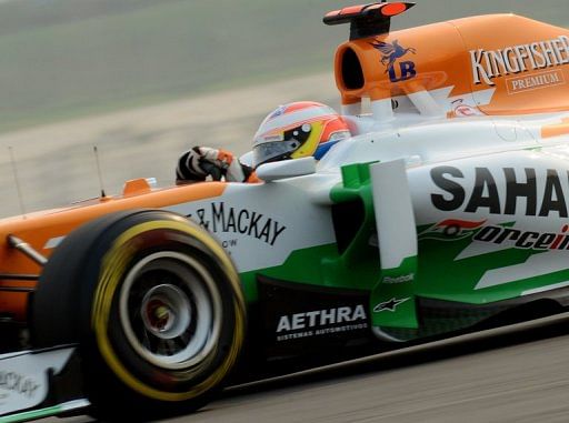 Force India driver Paul di Resta of Britain  powers his car in New Delhi on October 26, 2012