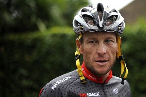 Armstrong, pictured on July 21, 2010 in Pau, France, was paid $480,000 by the newspaper in a lible case