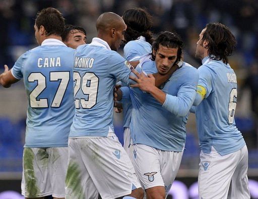 Lazio players celebrate after Sergio Floccari scored a goal against Atalanta in Rome on January 13, 2013