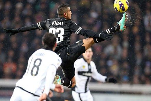 Juventus&#039; Arturo Vidal kicks the ball on January 13, 2013 at the Tardini stadium in Parma