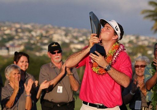 Russell Henley celebrates winning the Sony Open in Hawaii on January 13, 2013
