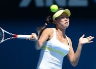 Chang Kai-Chen hits a return to Samantha Stosur (unseen) at the Australian Open in Melbourne on January 14, 2013