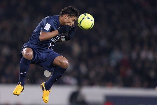 Paris Saint-Germain&#039;s Thiago Silva heads the ball on January 11, 2013, at the Parc des Princes