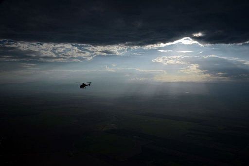 A helicopter flies over Tucuman before the Stage 9 of the Dakar 2013 between Tucuman and Cordoba on January 14, 2013