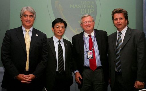 Brad Drewett (far R) at a press conference during the US Open on September 1, 2005