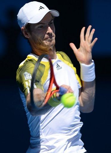 Andy Murray plays a return to Robin Haase at the Australian Open on January 15, 2013