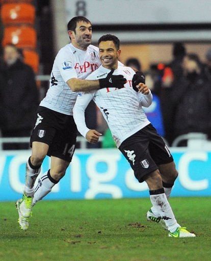 Fulham&#039;s Kieran Richardson (R) celebrates with Giorgos Karagounis at Blackpool on January 15, 2013