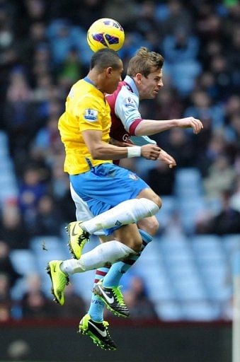 Southampton defender Nathaniel Clyne (L) and Aston Villa striker Andreas Weimann battle for the ball on January 12, 2013