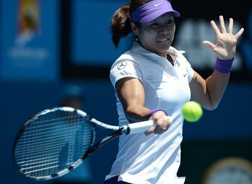 Li Na plays a return during her match against Olga Govortsova at the Australian Open in Melbourne on January 16, 2013