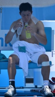 Japan's Kei Nishikori feels the heat at the Australian Open in a steamy Melbourne on January 16, 2013