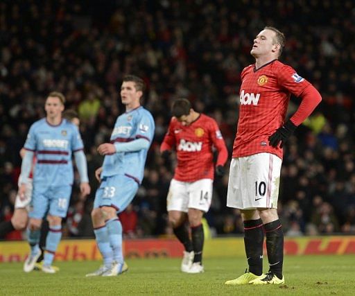 Wayne Rooney misses his penalty kick during the third-round replay at home to West Ham United on January 16, 2013