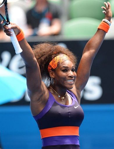 Serena Williams celebrates victory against Garbine Muguruza at the Australian Open in Melbourne on January 17, 2013