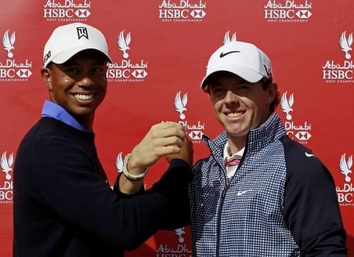 Tiger Woods (left) Rory McIlroy during a photocall ahead of the 20th Abu Dhabi Golf Championship on January 15, 2013