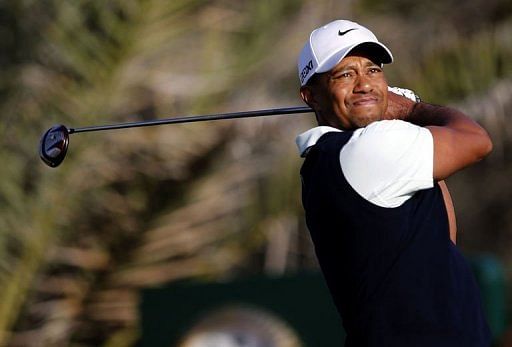 Tiger Woods plays a shot during the first round of the Abu Dhabi Golf Championship on January 17, 2013