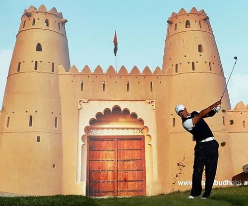 Tiger Woods plays a shot during the first round of the Abu Dhabi Golf Championship on January 17, 2013